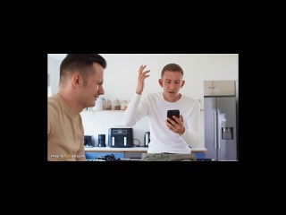 two guys predicted a lady on the bed